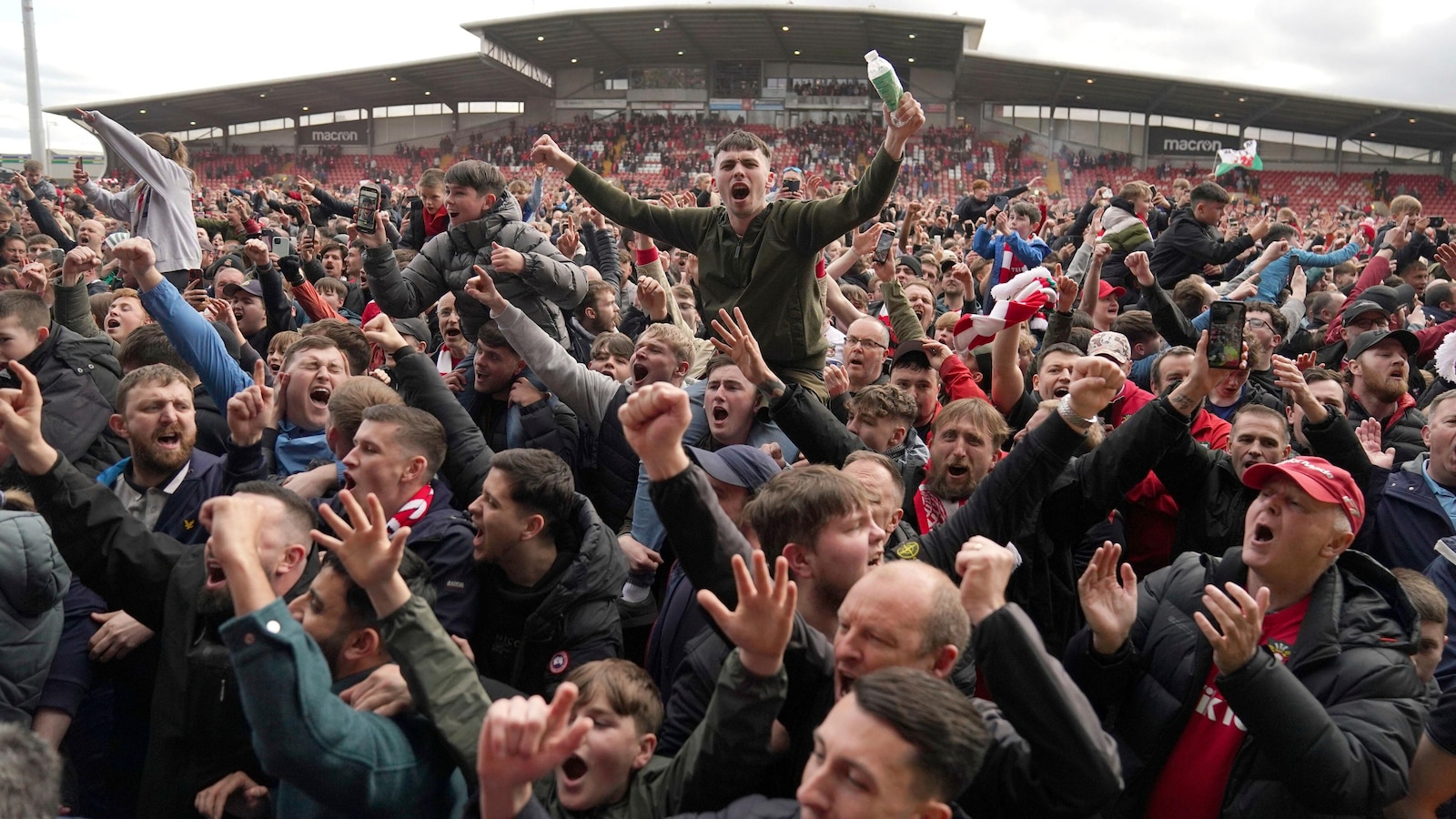 Ryan Reynolds celebrates ‘ride of our lives’ as Wrexham gains promotion to English 3rd division