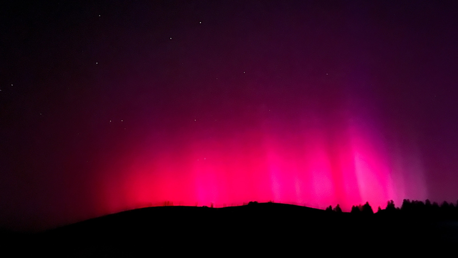 Solar storm puts on brilliant light show across the globe, but no serious problems reported