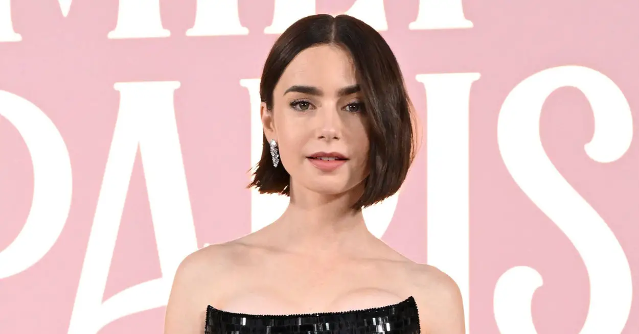 Lily Collins Stuns In Black Dress At “Emily In Paris” Premiere