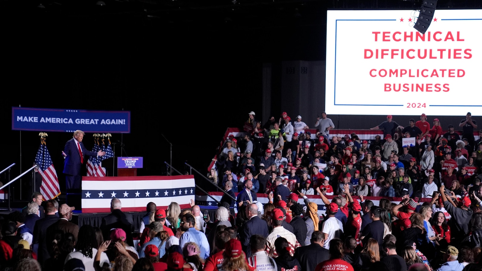 A failed mic leaves Donald Trump pacing the stage in silence for nearly 20 minutes